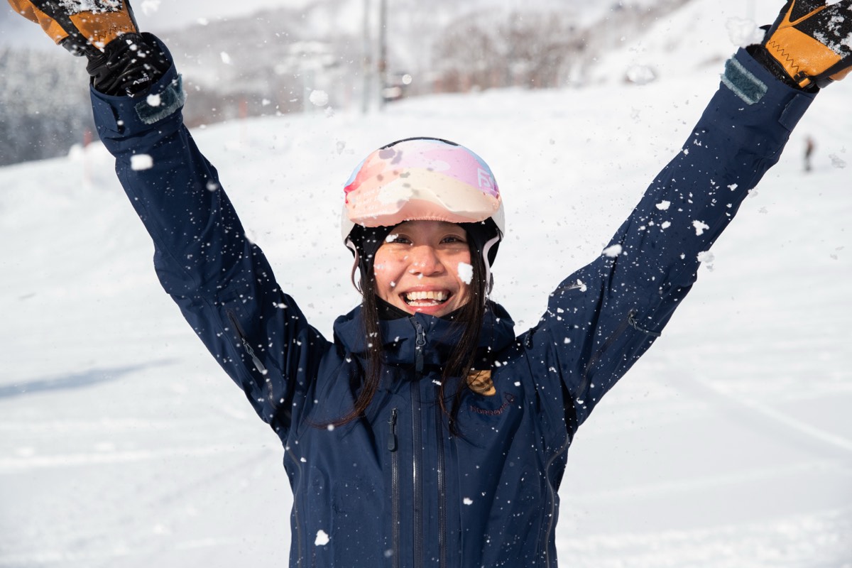 A guest celebrating on the slopes